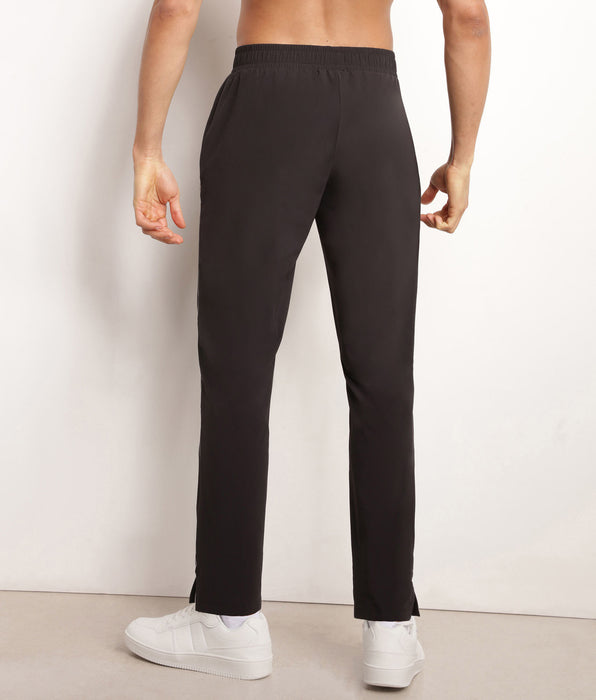 DIM Pantalon de sport chino pour homme en jersey stretch Noir Dim Move
