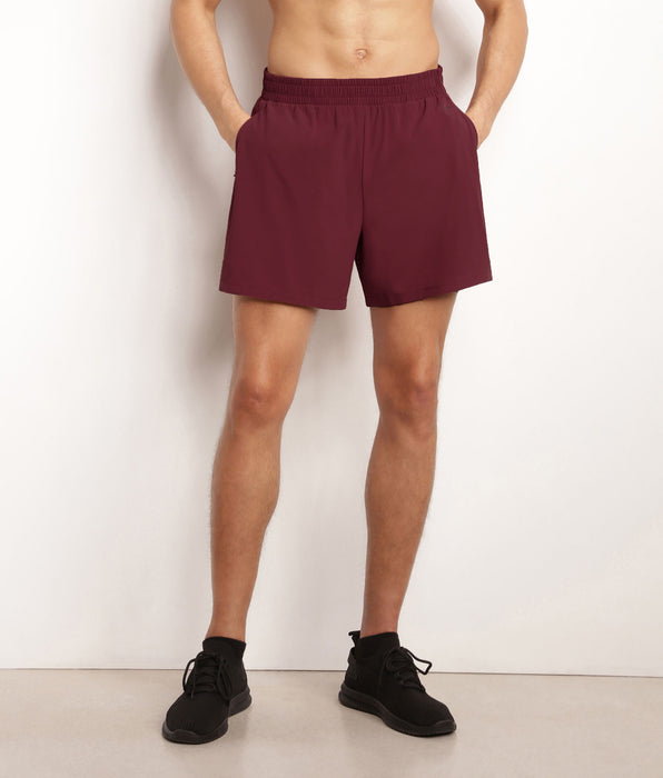 DIM Short de sport homme en matière aérée Bordeaux Dim Move