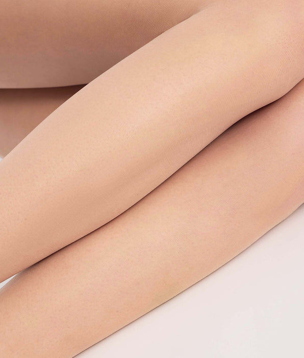 DIM Collant transparent Nude clair