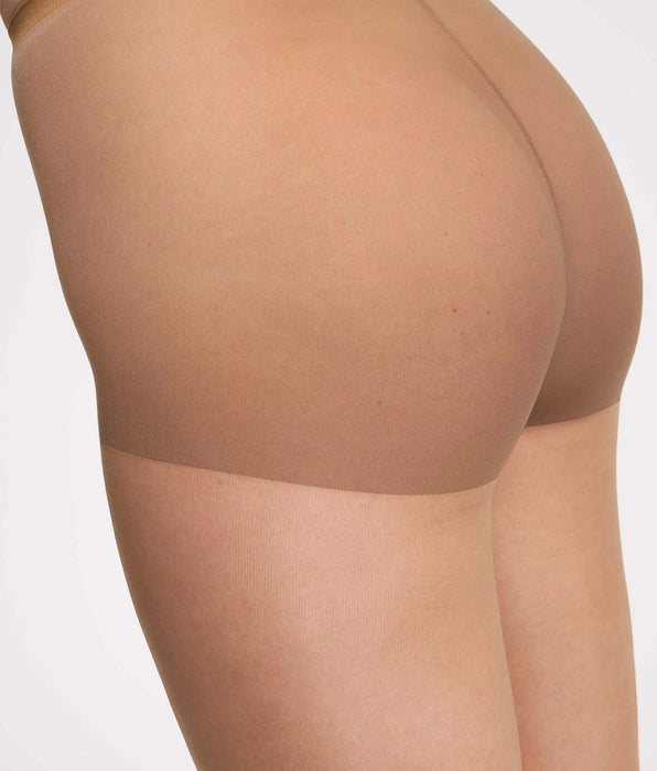DIM Collant transparent Nude medium foncé
